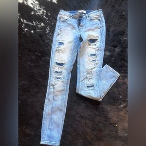 KanCan skinny jeans with patches